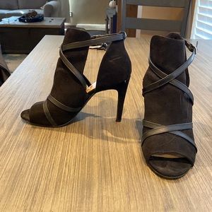 Black twisted strap heels